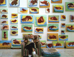 David_Hockney_with_wall_of_dog_paintings_Dog_Days